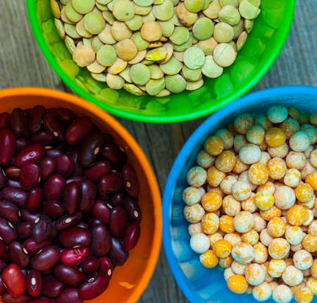 top view of a variety of colorful pea, lentil and bean