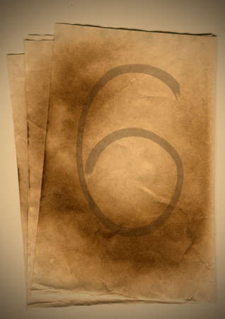vintage paper with the inscription sixの写真素材