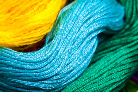 varicolored threads floss for embroidery, shallow depth of field