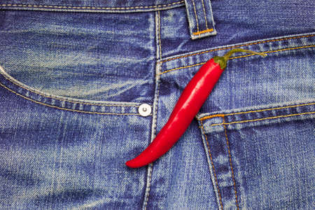 red hot chili peppers in a jeans backgroundの写真素材
