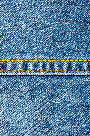 vintage denim background with seamsの写真素材