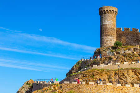 Tossa de Mar, Costa Brava, Catalonia, Spain, JUNE 19, 2013: Watchtower of the medieval fortress Vila Vella, sightseeing toursのeditorial素材