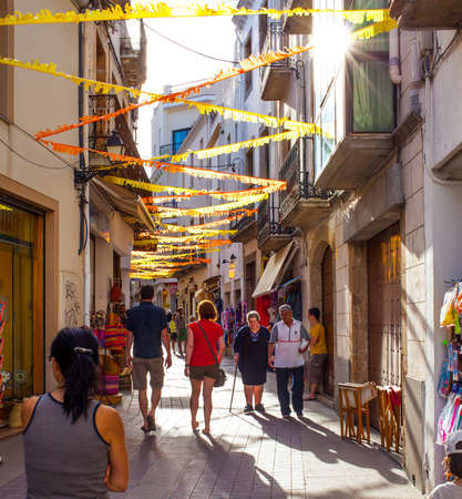 Tossa de Mar, Catalonia, Spain, 2013.06.22, Carrer la GuÃÂ rdia street on the eve of the feast of San Miguel. Editorial use onlyのeditorial素材