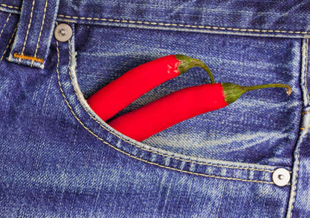 red hot chili peppers in a jeans pocketの写真素材