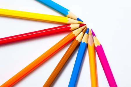 set of colored pencils on white background with copy spaceの写真素材