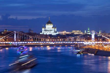 night landscape with views of the Moskva River and Crimean bridge with illumination. long exposure and blurred movementの写真素材