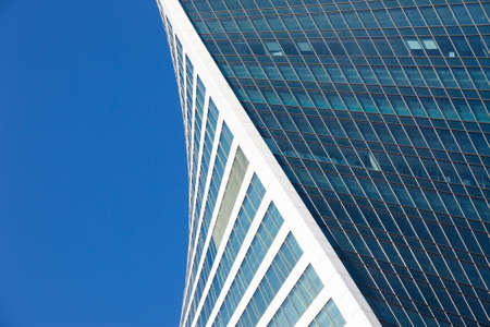 office building on the blue sky background. unusual urban architectureの写真素材