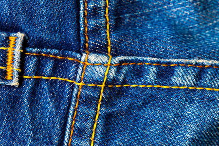 old denim surface with seams, close upの写真素材