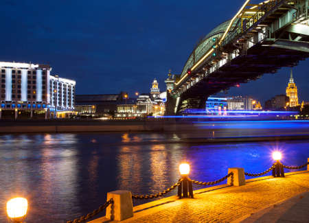 panorama of the city at night from the Bridge of Bogdan Khmelnitsky and the Moscow River in the area of the Kiev station. Moscow, Russiaの写真素材