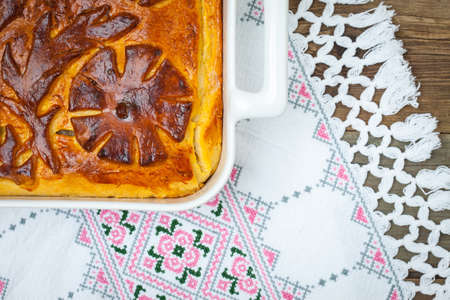 turnover in a white ceramic pot on vintage table