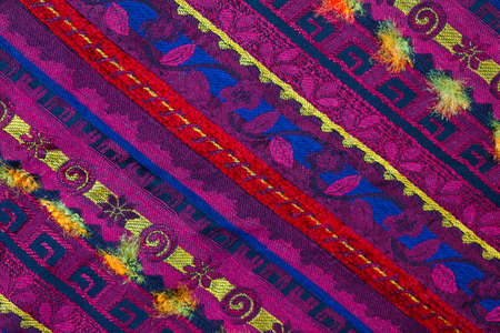 Vintage tape, surface with embroidered patterns. close up, macro