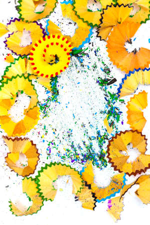 colored shavings and crumb of pencil lead on white backgroundの写真素材