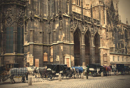 Vienna, Austria, June 26, 2013: horse-drawn carriages near the walls of St. Stephen's Cathedralのeditorial素材