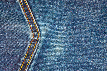 aged jeans background with seam, close upの写真素材