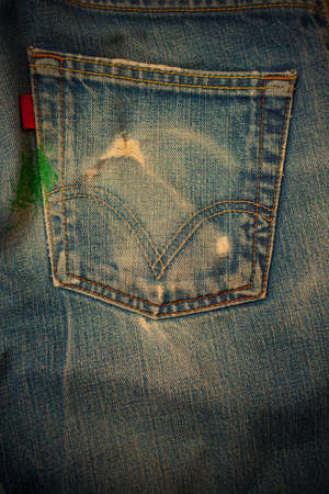 pocket for carrying a mobile phone on old jeans, instagram image styleの写真素材