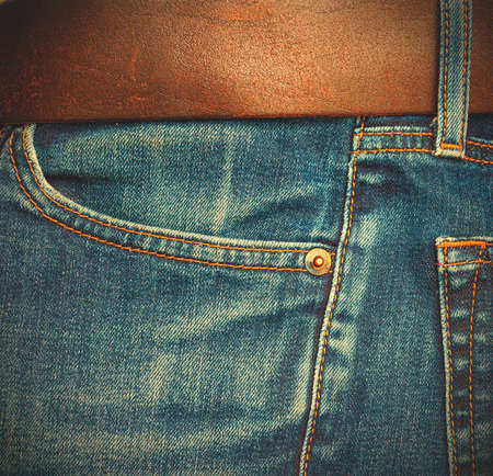 jeans with a brown leather belt, side view. instagram image styleの写真素材