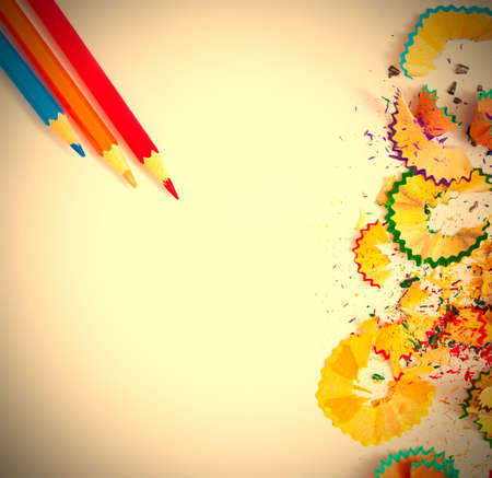 colored shavings and pencils on white background with copy space. instagram image retro styleの写真素材