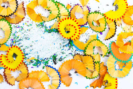 colored pencil shavings on the white background. close upの写真素材