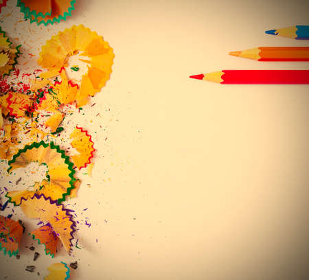 colored pencils and shavings on white background with copy space. image retro styleの写真素材