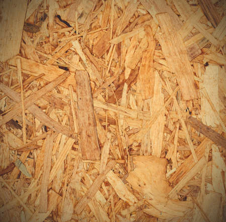 surface of recycled pressed tree chips. background, texture. image filter retro style