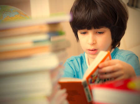 boy reading a book, portrait.