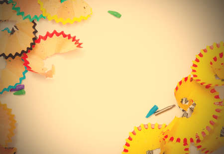 white backdrop with colored pencils shavings and copy space.の写真素材