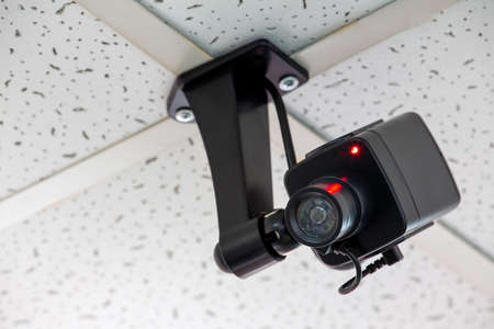 black ceiling surveillance camera