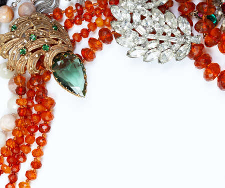 Beauty, fashion. Jewelry collection. Lots of antique jewelry with copy-space. Corals, glass, emeralds, bone, crystals.の写真素材