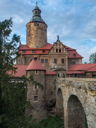 Czocha, Poland-August 25, 2019: View on main gate and outer bastion from the inside of castle bailey. Visible tourist bar and the ticket sales point.のeditorial素材