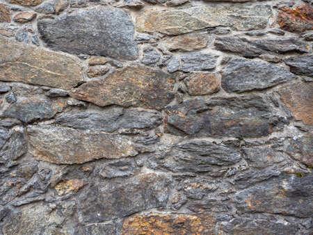 Details of old stronghold wall. Rough natural rocks for texture or background.の写真素材