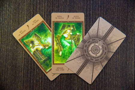Tarot cards on the wood. Labirinth tarot deck. Esoteric background.のeditorial素材