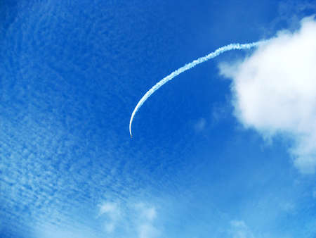 The plane in white clouds  Photo with air show