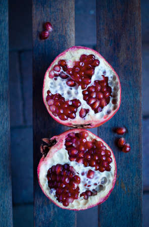Two halves of pomegranateの写真素材