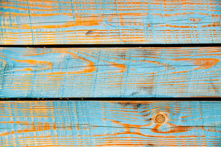 Texture of three cyan and orange rough wooden planksの写真素材