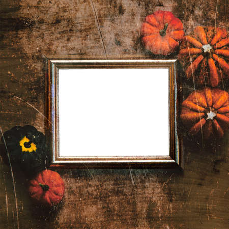 Grungy textured halloween frame with five pumpkinsの写真素材