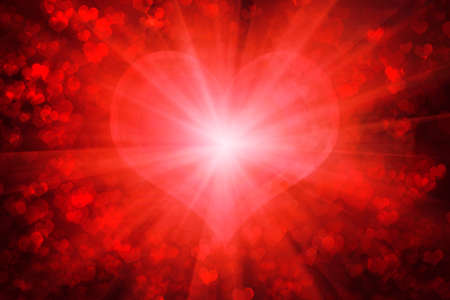 Red glowing heart shaped bokeh for Valentine's day backgroundの写真素材