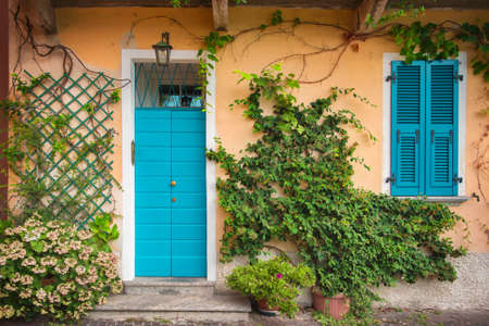 Colorful door and shutters. Mandello del Lario,Lake Como, Italyの写真素材