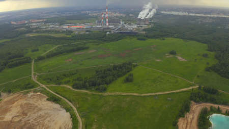 Artificial lake for discharging chemical waste from a chemical plant. Environmental pollution. Ecological catastrophy. Aerial shot . Beautiful view.の写真素材