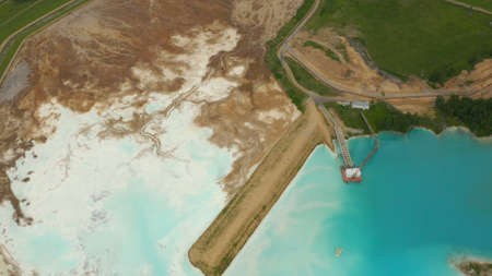 Artificial lake for discharging chemical waste from a chemical plant. Environmental pollution....