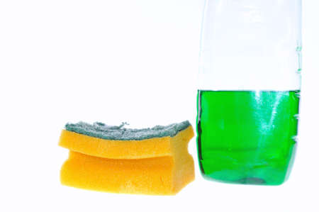 Sponge soap and dishwasher.の写真素材