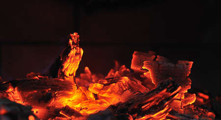 Embers in the fireplace.