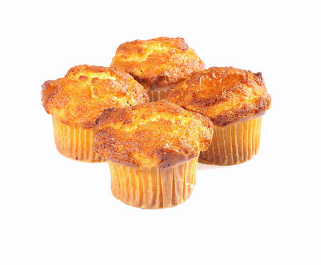 Home made muffins isolated on white background.