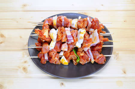 Pork kebabs  preparing on a kitchen table の写真素材