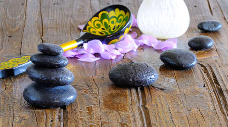Volcanic hot stones for massage on a table の写真素材