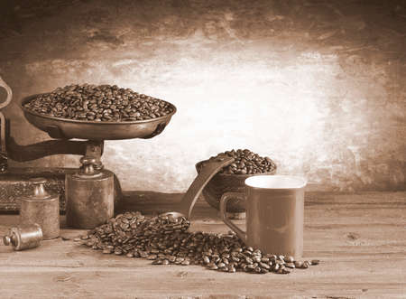 Coffee cup with scale and coffee beans の写真素材