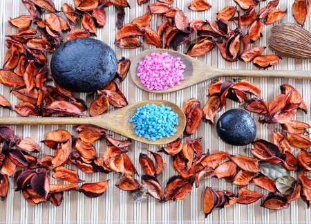 Volcanic hot stones and bath salts on a table の写真素材