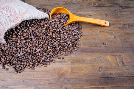 Bag of coffee beans on the table 