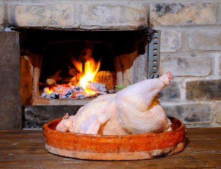 Turkey prepared to put in the oven.の写真素材