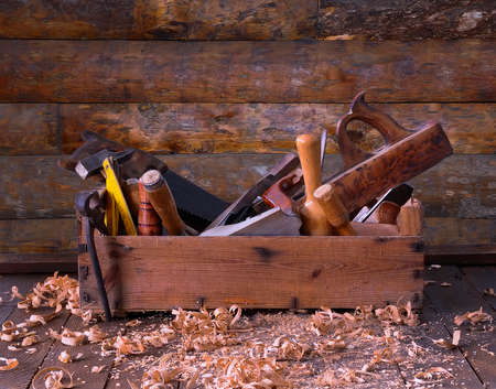 Old toolbox on the workbench in a carpentry