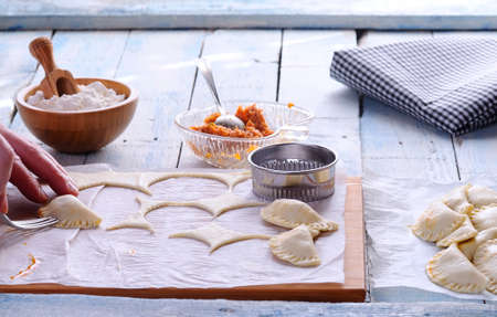 Small pies on the table, typical Spanish food.の写真素材